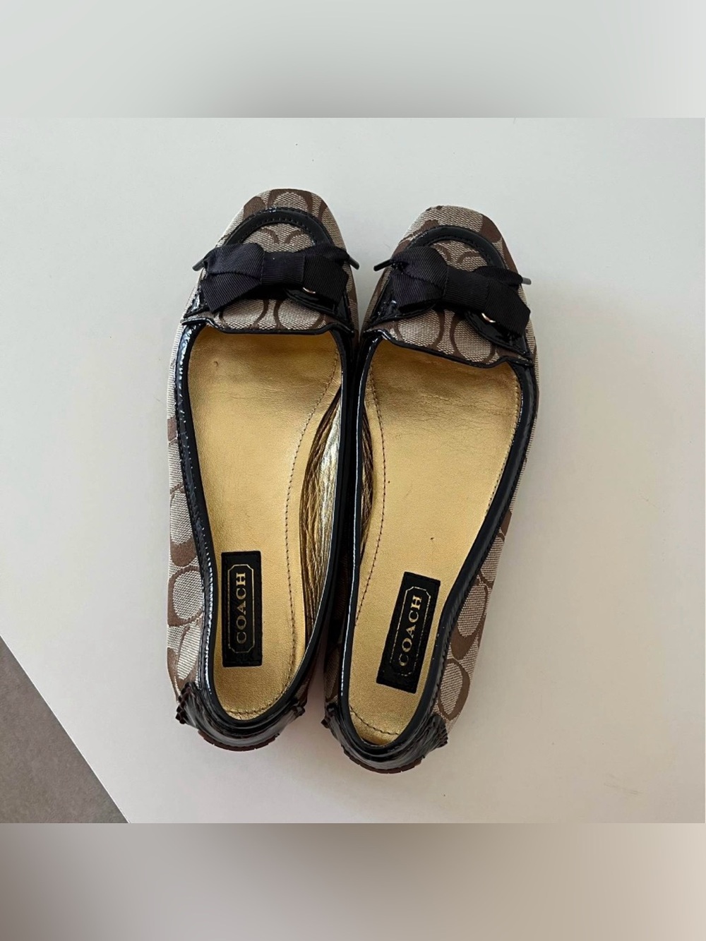 Coach Signature Canvas Bow Ballet Flats in Brown and Black